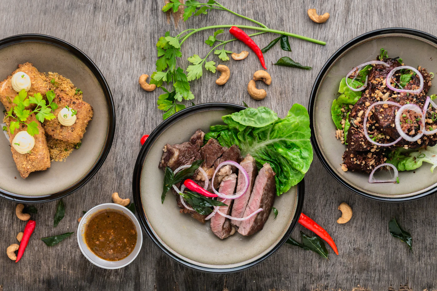 A table full of colourful dishes